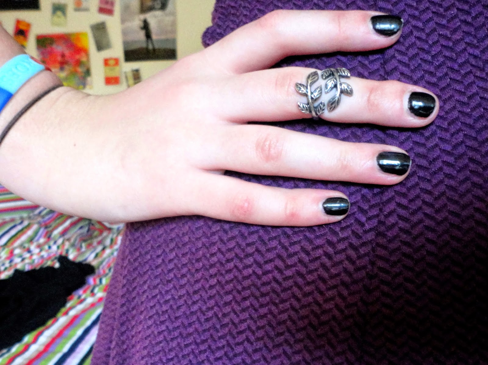 silver leaf ring with black nail polish & purple dress