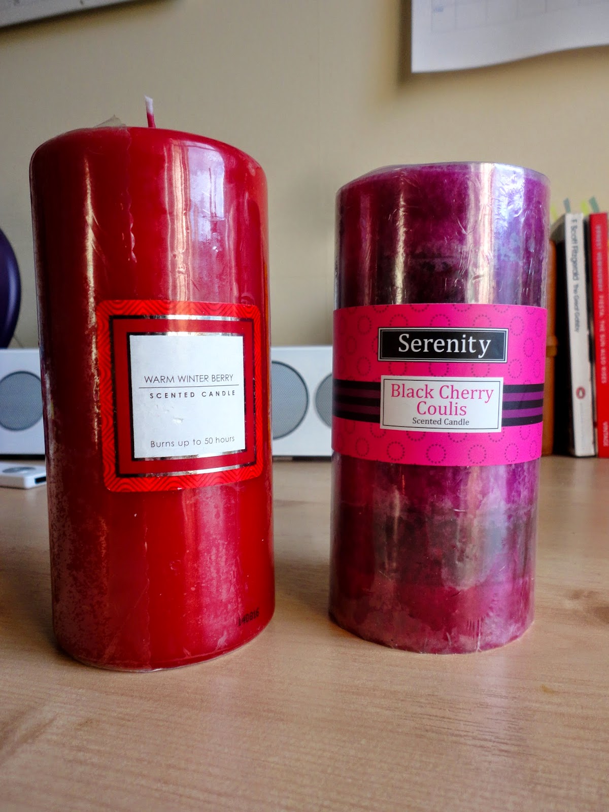 Red and purple scented pillar candles