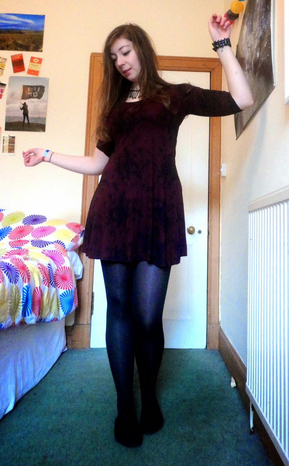 Wildflowers | outfit of short black and purple floral dress, with black flat shoes, tights and jewellery