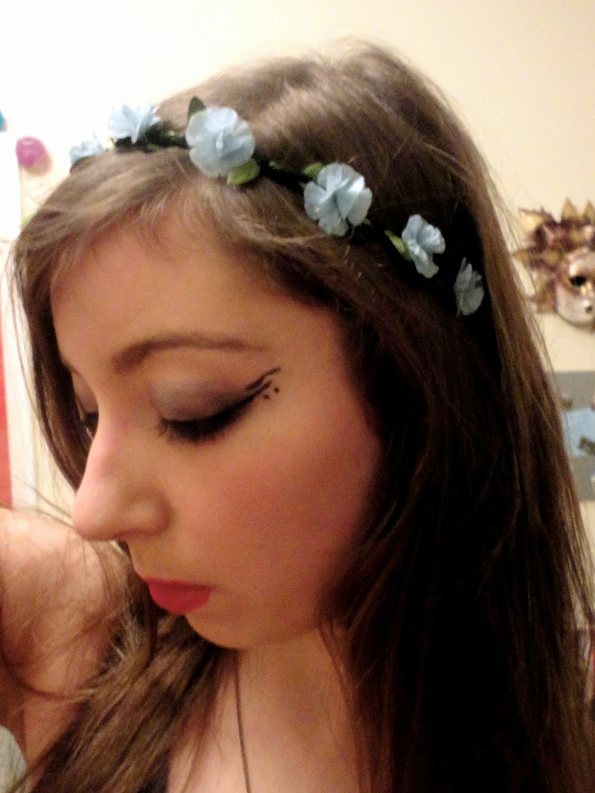 Birthday party nymph elf outfit details of blue flower crown and eye makeup