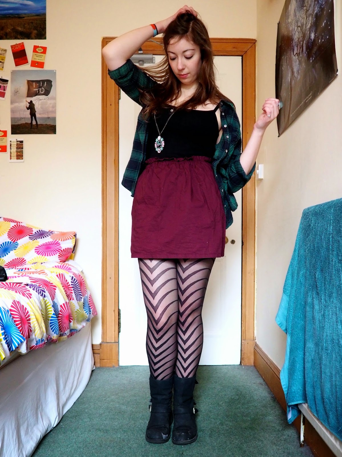 Statement pieces outfit | Green checked shirt, black vest, purple skirt, patterned tights & black biker boots
