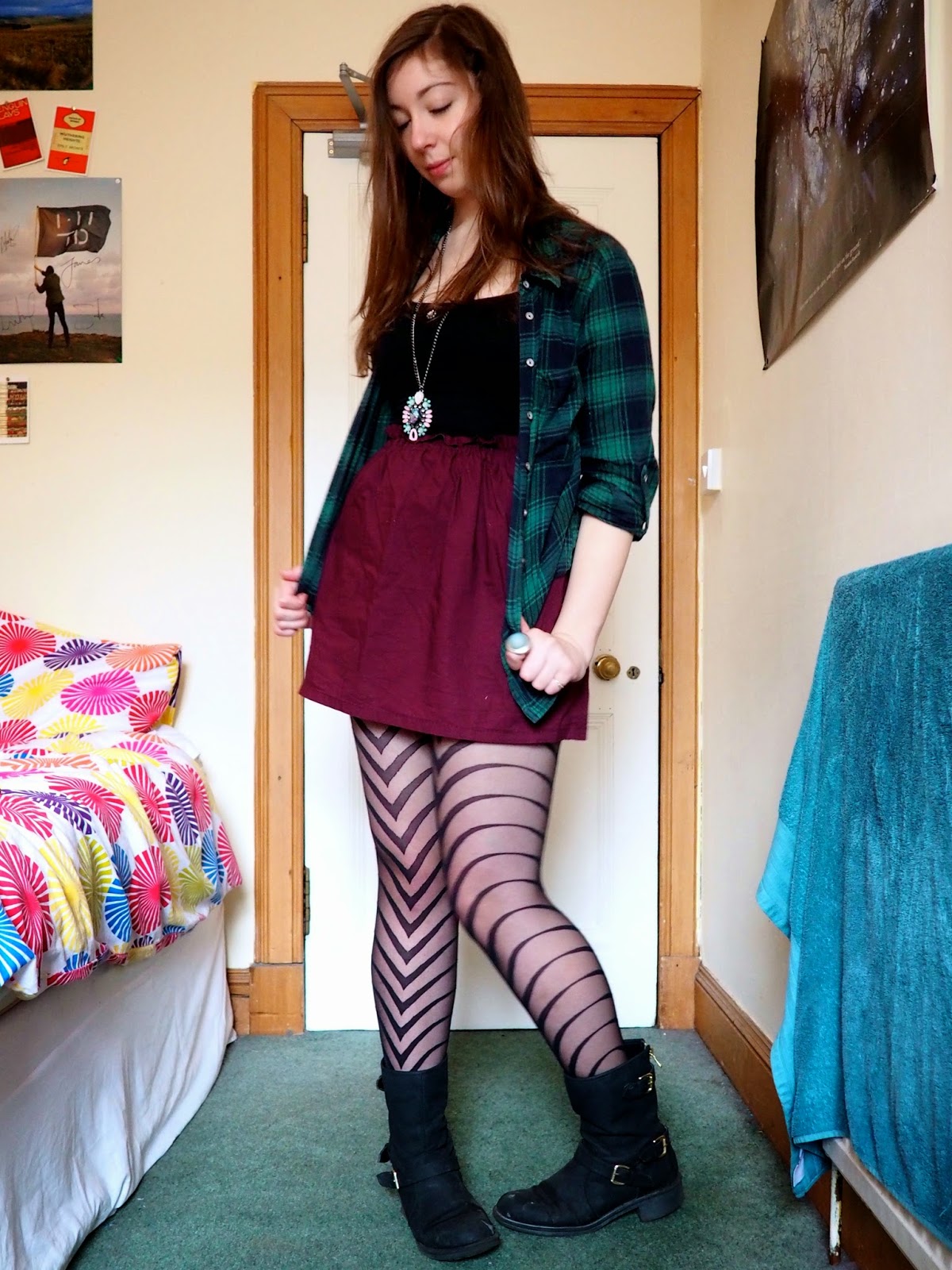 Statement pieces outfit | Green checked shirt, black vest, purple skirt, patterned tights & black biker boots