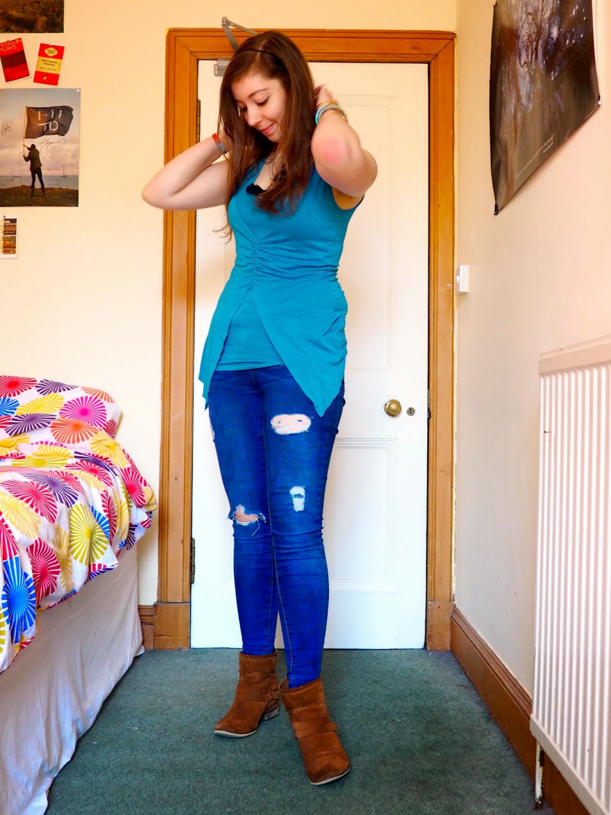 Blue Jeans outfit | Blue layered vest top, ripped skinny jeans, brown ankle boots