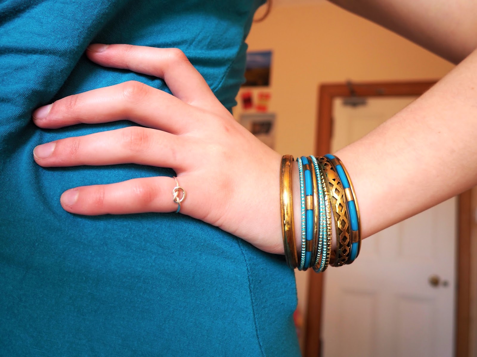 Blue Jeans outfit jewellery details - blue and gold bangles, silver knot ring