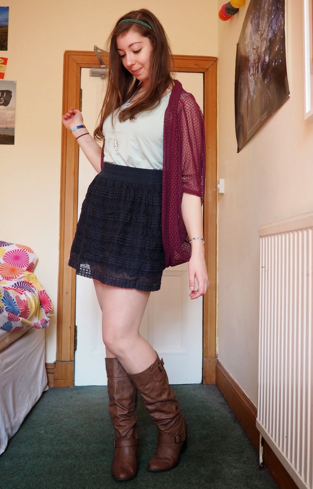 Light Layers outfit | purple-pink knit shrug, green vest, dark blue lace skirt, tall brown leather boots