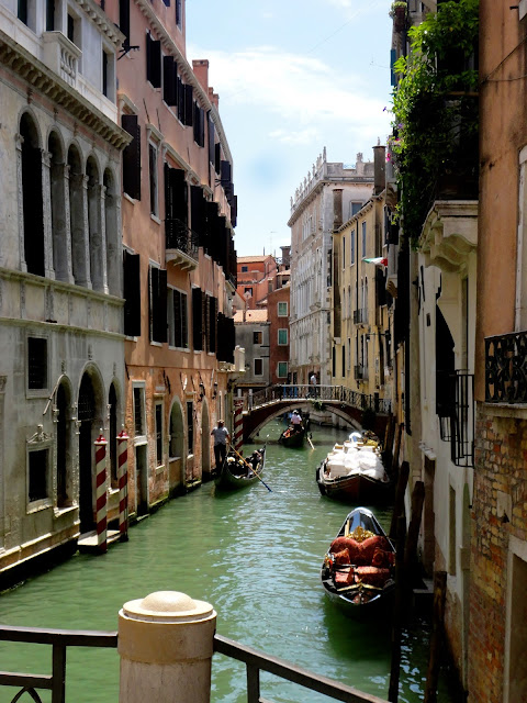 Canal and gondolas in Venice, Italy
