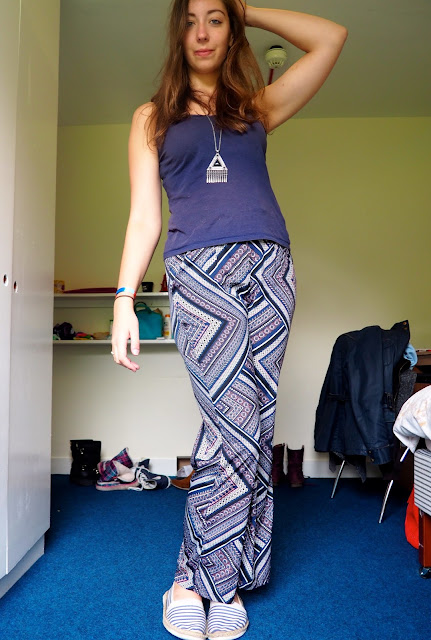 Printed Patterns | outfit of dark blue vest top, blue, purple and pink patterned trousers, and striped espadrilles