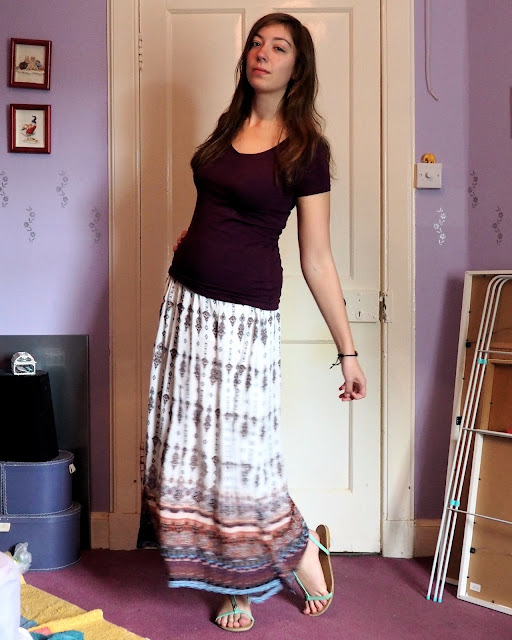 Ethereal | outfit of plain purple top, patterned maxi skirt and green strappy sandals
