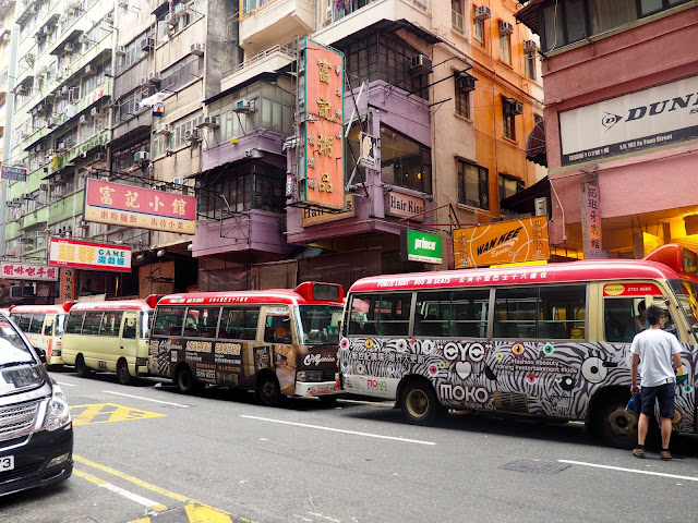 Red top minibuses in the streets of Mong Kok, Kowloon, Hong Kong