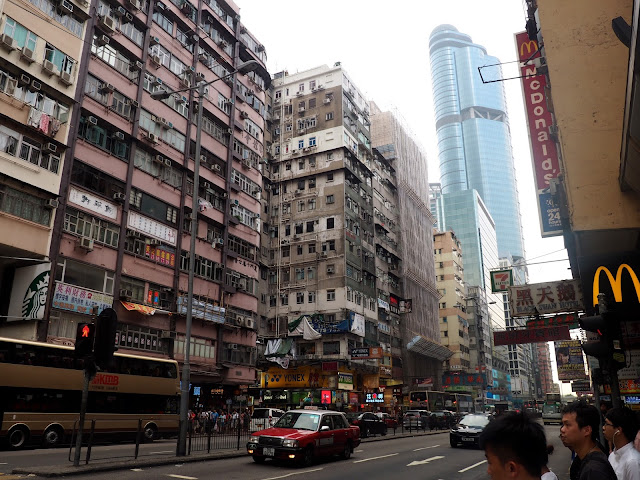Skyscrapers and traffic on Argyle Street in Mong Kok, Kowloon, Hong Kong