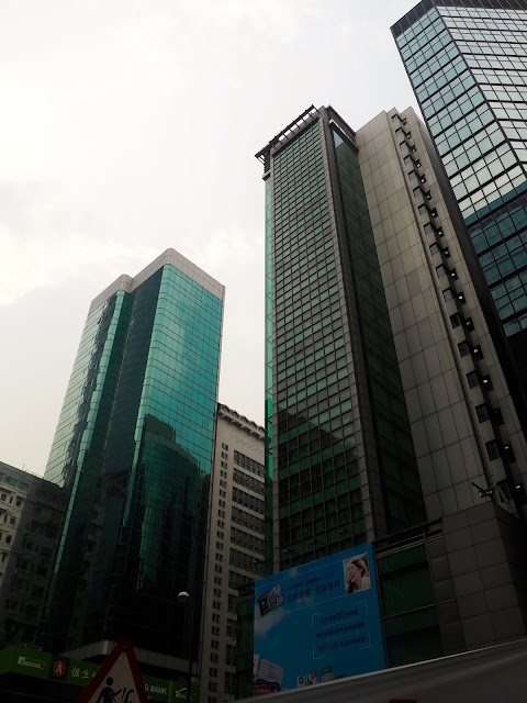Glass window skyscrapers on Nathan Road in Mong Kok, Kowloon, Hong Kong