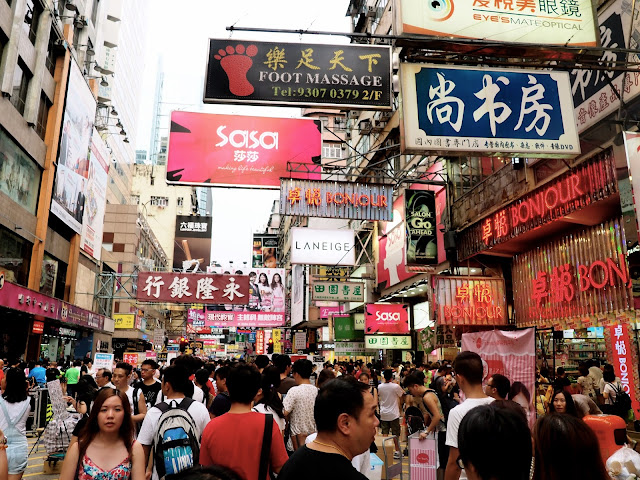 Colourful signs & crowds of people on Sai Yeung Choi Street, Mong Kok, Kowloon, Hong Kong