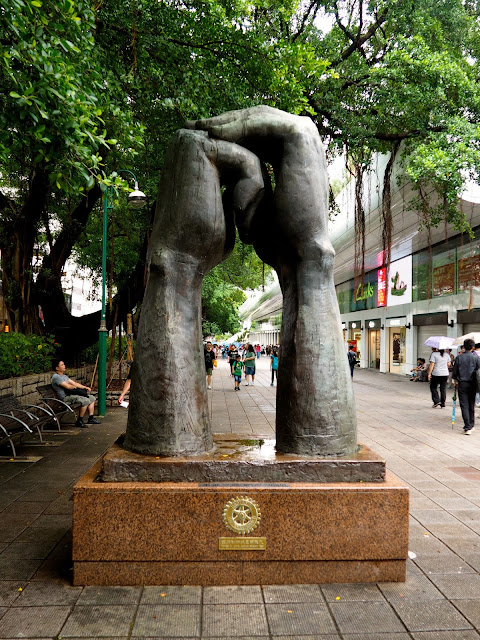Holding hands statue on Nathan Road, TST, Kowloon, Hong Kong