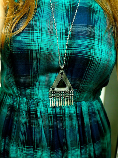 Taste of Tartan | outfit jewellery details of black and silver tribal pendant necklace, worn with green tartan dress