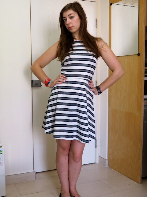 Simple Stripes | outfit of black & white striped skater dress with black flat shoes for work