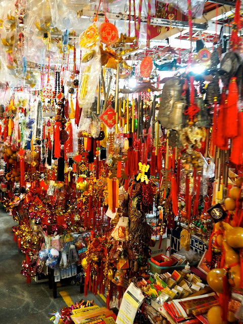Colourful Chinese souvenirs for sale outside Sik Sik Yuen Wong Tai Sin Temple, Hong Kong