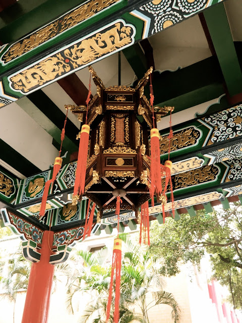 Traditional Chinese ornamentation - roof detailing & lantern at Sik Sik Yuen Wong Tai Sin Temple, Hong Kong