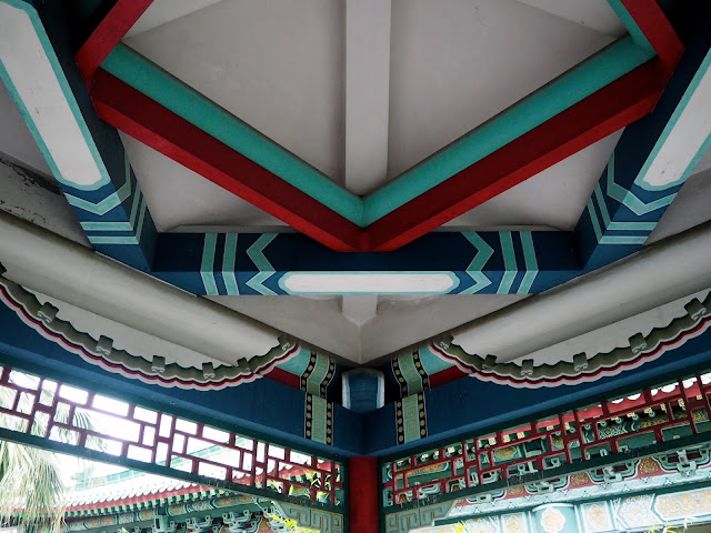 Detailing of the roof / ceiling of a Chinese pavilion in the gardens of Sik Sik Yuen Wong Tai Sin Temple, Hong Kong