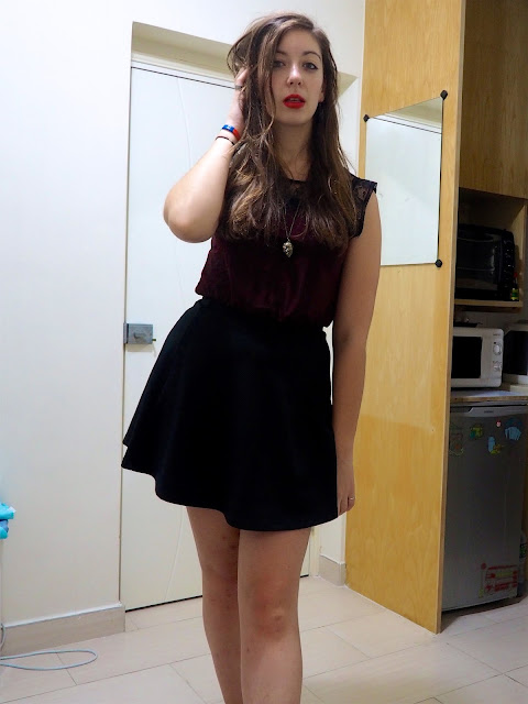 Something Wicked | night out outfit of red top with black lace, and black skater skirt