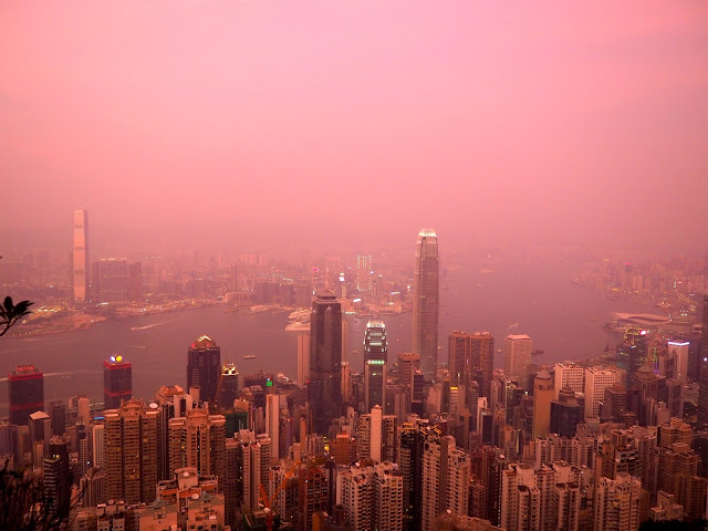 View of Hong Kong, inc. Kowloon & Victoria Harbour, at sunset from The Peak