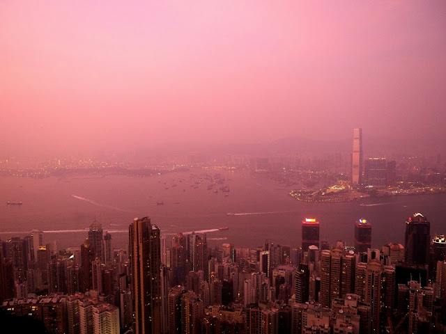 View of Hong Kong, inc. Kowloon & Victoria Harbour, at sunset from The Peak