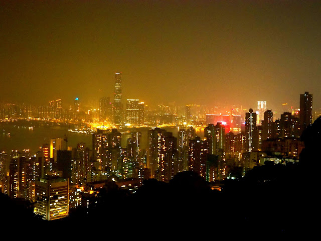 View of Hong Kong, inc. Kowloon & Victoria Harbour, at night from The Peak