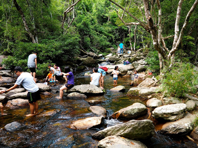 People paddling in the stream near Bride's Pool, Plover Cove Country Park, New Territories, Hong Kong