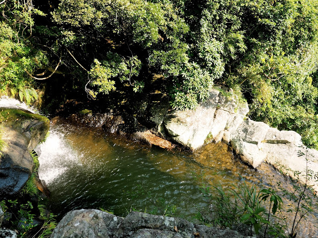 Small waterfall into the pool at the top of Mirror Pool Cascade, Plover Cove Country Park, New Territories, Hong Kong