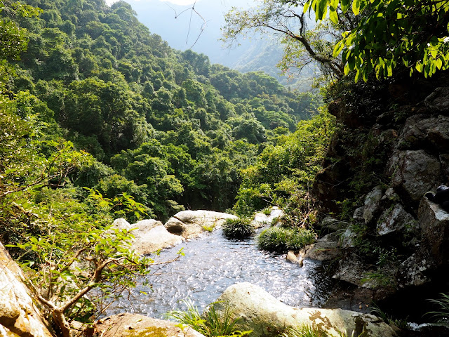 Small pool and mountain views from the top of Mirror Pool Cascade, Plover Cove Country Park, New Territories, Hong Kong