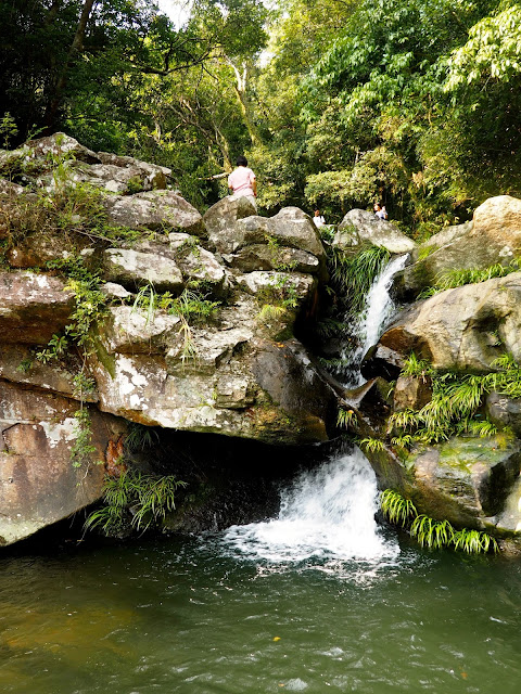 Waterfall into the small pool at the top of Mirror Pool Cascade, Plover Cove Country Park, New Territories, Hong Kong