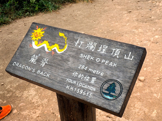 Wooden sign for Shek O Peak, on the Dragon's Back hiking trail, Hong Kong Island