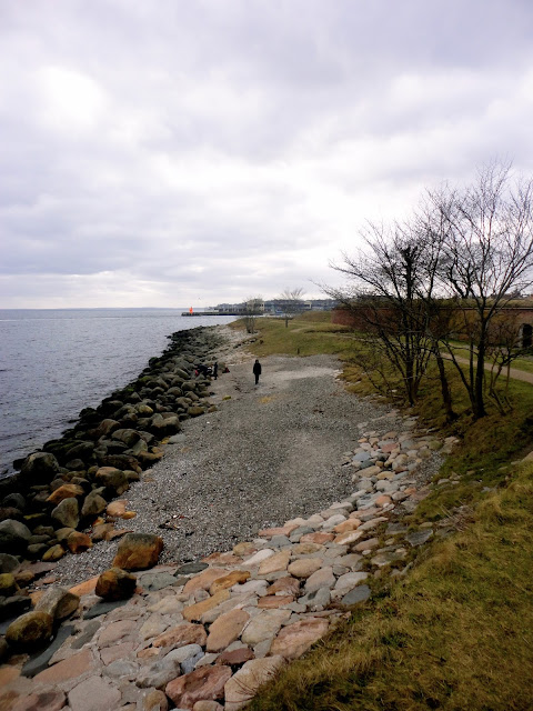Coastal walk, with trees, beach, and ocean view beside Kronborg Castle, Helsingor, Copenhagen, Denmark