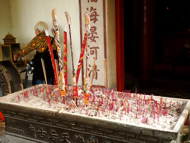 Incense sticks and prayer outside Tin Hau Temple, Yung Shue Wan, Lamma Island, Hong Kong