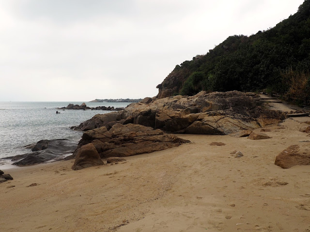 Rock formations by the sea at Hung Shing Yeh beach, Lamma Island, Hong Kong