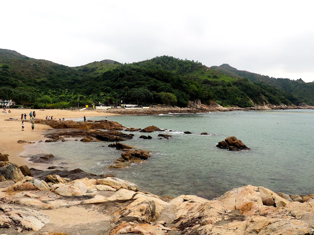 View of rocks, sand and the sea at Hung Shing Yeh beach, Lamma Island, Hong Kong