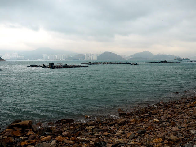 View out to sea, with Aberdeen on Hong Kong island in the distance, from near Sok Kwu Wan, Lamma Island, Hong Kong