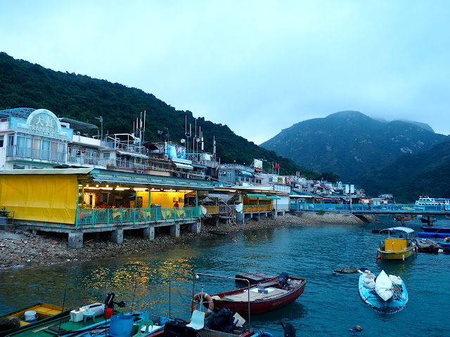 Sok Kwu Wan village waterfront, with seafood restaurants and small fishing boats, on Lamma Island, Hong Kong