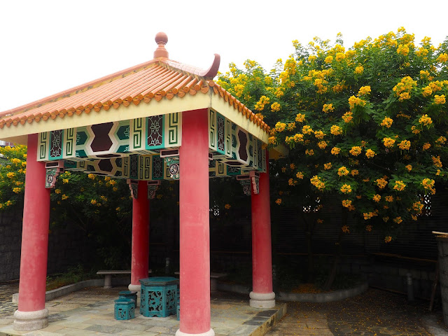 Pavilion and flowers outside Pak Tai Temple, Cheung Chau Island, Hong Kong