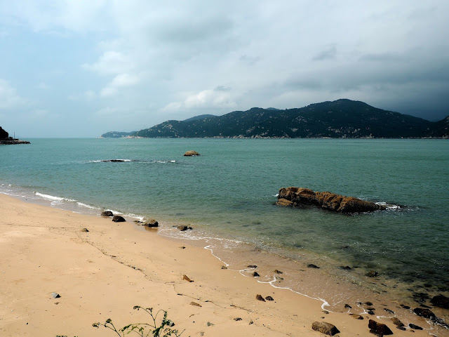 View of Lantau Island from a beach on the north side of Cheung Chau Island, Hong Kong