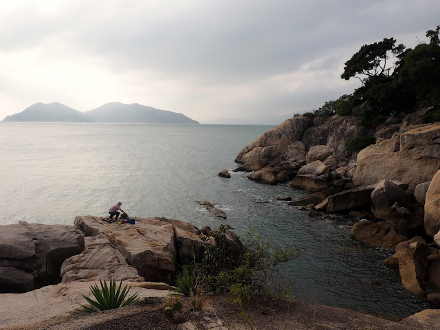 Rocks by the ocean, neat Cheung Po Tsai cave and Reclining Rock on Cheung Chau Island, Hong Kong