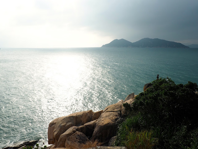 Ocean view towards Shek Kwu Wan Island at sunset from Reclining Rock on Cheung Chau Island, Hong Kong
