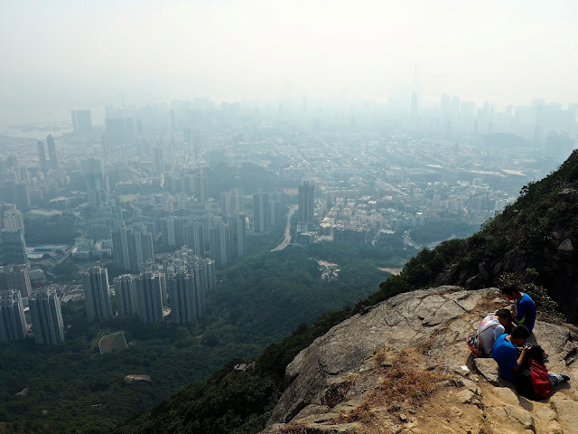 View of Kowloon, with smog and pollution, from the top of Lion Rock, Hong Kong.