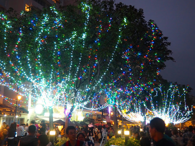 Colourful Christmas lights on trees along Stanley waterfront, Hong Kong