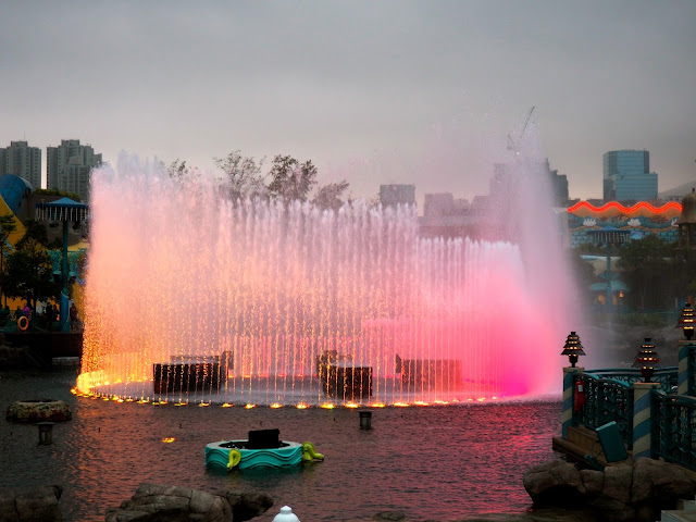 Fountain with coloured lights in the evening, in Aqua City Lagoon, Ocean Park, Hong Kong