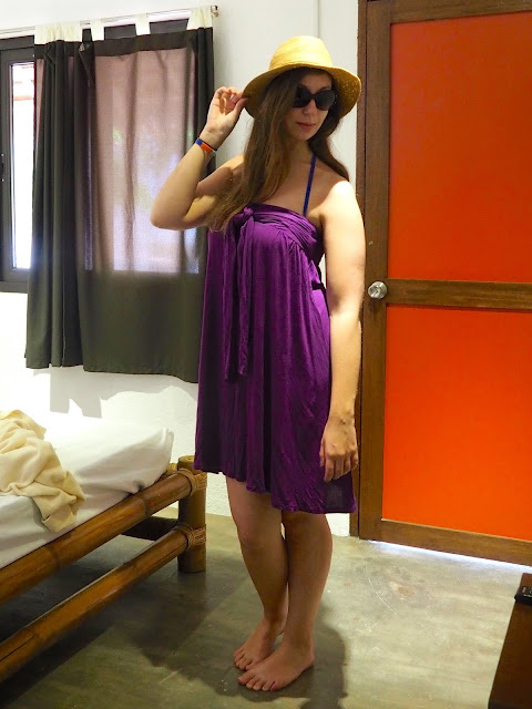 Holiday Mood | beach outfit of blue 2 piece bikini, with loose purple cover-up dress, with sun hat and sunglasses