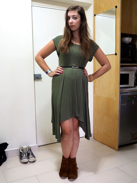 In the Jungle | work outfit of long, loose, forest green dress with belted waist and brown ankle boots