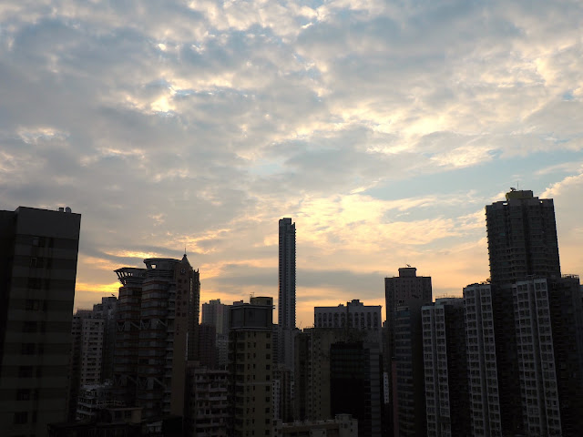 Sunrise over Mong Kok skyscrapers, Kowloon, Hong Kong