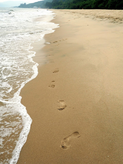 Footprints in the sand on Cheung Sha beach, Lantau Island, Hong Kong