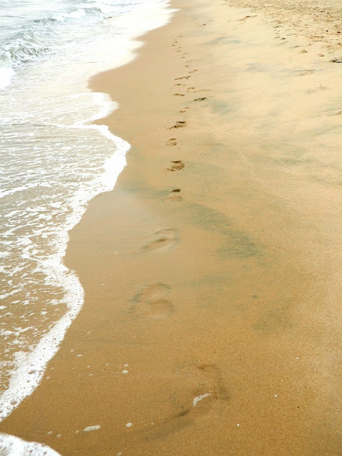Footprints in the sand on Cheung Sha beach, Lantau Island, Hong Kong