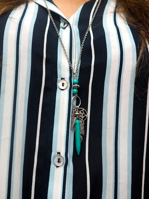 Living on the Edge | outfit jewellery details of silver and turquoise pendant necklace, with arrow head, dreamcatcher and feather charms